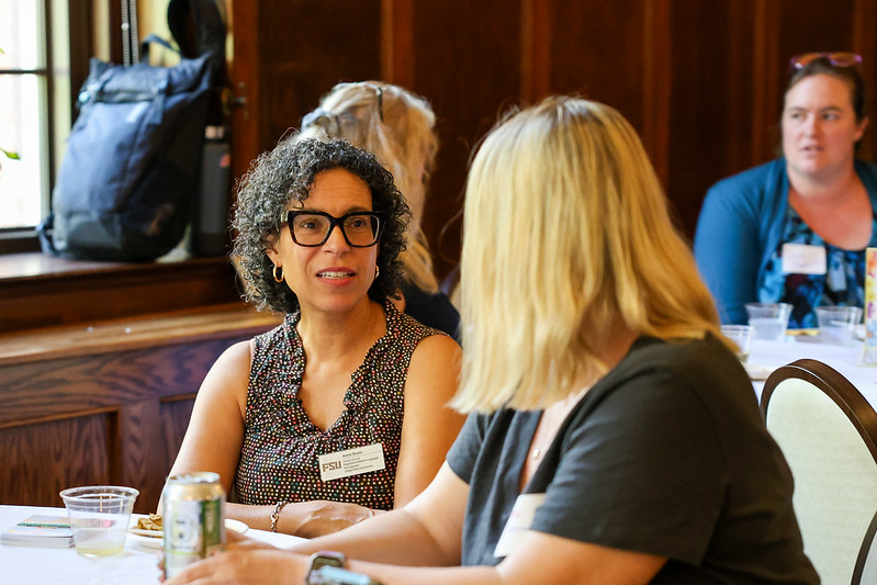 Faculty chatting at the 2025 Faculty Recharge Launch Event